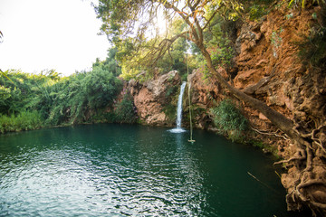 Small natural Waterfall Pego do inferno in Tavira at the Algarve Portugal
