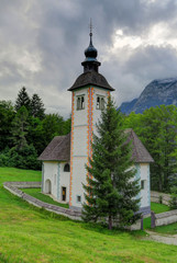 Fototapeta na wymiar The Church of the Holy Spirit on Lake Bohinj, Slovenia
