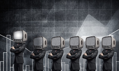 Businessmen with old TV instead of head.
