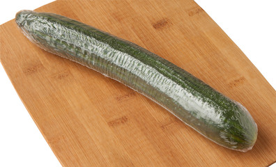 Packing of natural fresh cucumbers isolated on a white background