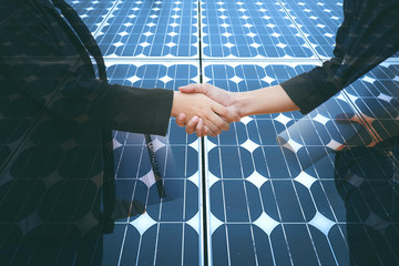 Business, Partnership,Cooperation and gesture concept - businesswoman and architecture shaking...