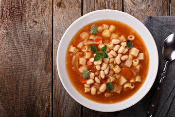 Vegetarian minestrone soup with pasta and beans - obrazy, fototapety, plakaty