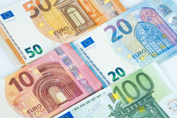 Stack of several euro banknotes money background.
