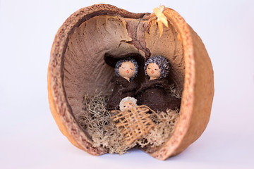 Nativity scene in a coconut shell. Front view
