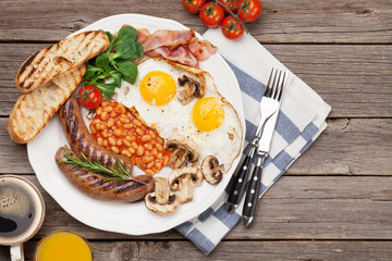 English breakfast. Fried eggs, sausages, bacon