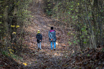 Fototapeta premium family walk with dog 