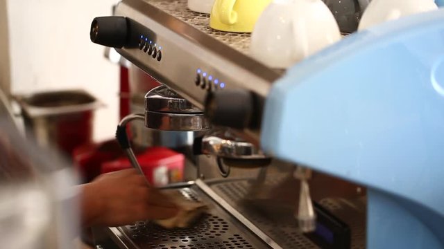 machine brewing a coffee.