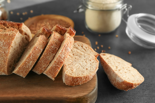 Sliced buckwheat bread on wooden board