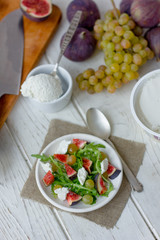 Beautiful vegetarian salad with goat cheese and figs.