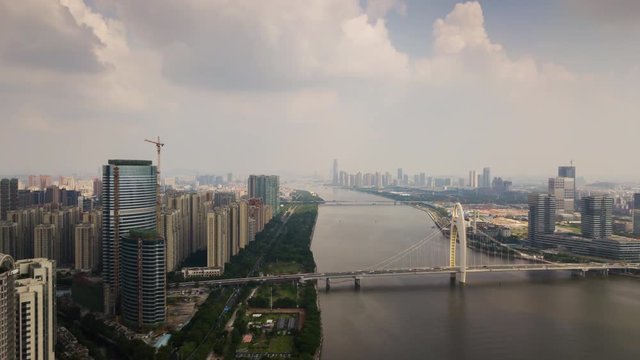 day time guangzhou bridge pearl river haixinsha island park aerial panorama 4k timelapse china
