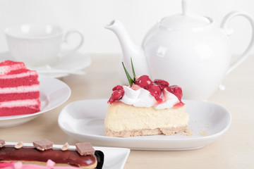 Beautiful cake and dessert on wooden table in pastel color - soft focus
