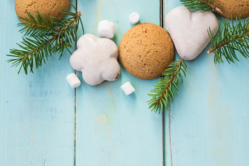 Fototapeta na wymiar Christmas decoration with fir tree, Christmas cookies and marshmallow