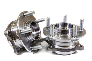 Two steel ball-bearing hub for automobile wheel, isolated on white background