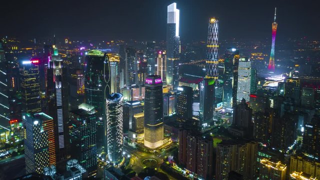 night time illuminated guangzhou city downtown famous buildings aerial panorama 4k timelapse china

