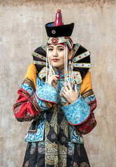 Fototapeta na wymiar Mongolian woman in traditional outfit