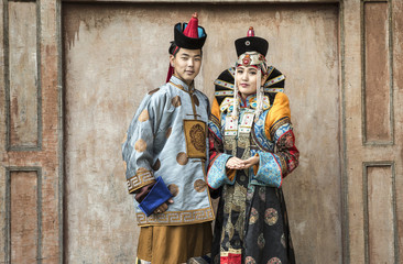 Fototapeta na wymiar mongolian couple in traditional outfit
