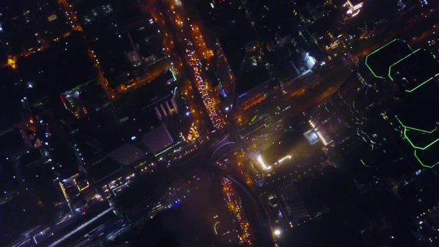 Spectacular aerial view of Victoria Harbor, skyscrapers and Hong Kong skyline at night. Aerial view of Hong Kong city. Hong Kong city at night