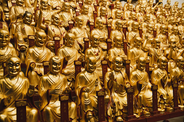 Gold statues of the Lohans in Longhua buddhist temple, Shanghai, China