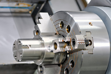 Metal detail in a spindle of the industrial lathe