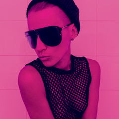  Tomboy Girll in Fashion accessory Beanie cap and sunglasses. Club Party Glamor Neon Light
