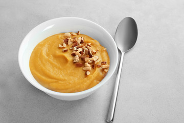 Bowl of homemade lentils creme soup on table