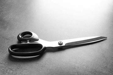 Tailoring scissors on grey background