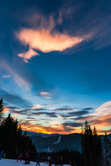 Obraz premium Clouds at the sunset in winter