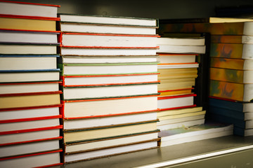Stack of old books in shelf