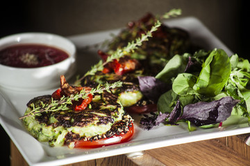 pancakes from courgettes with sauce