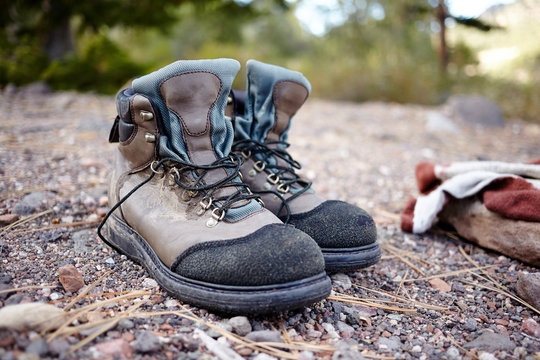 Pair of trekking boots standing outdoors