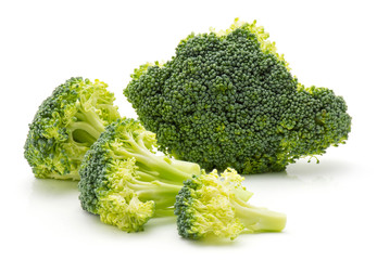 Fresh broccoli isolated on white background three pieces in row and one separated.
