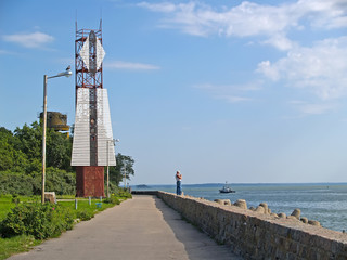 The slot-hole  alignment sign in Morskoy Boulevard. Baltiysk, Kaliningrad region