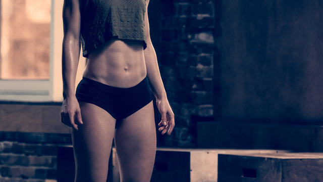 Slim sporty muscular woman