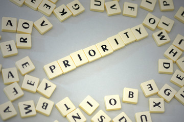 text priority on the gray background near the letters.
