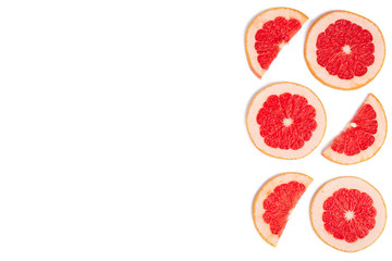 Grapefruit slices isolated on white background with copy space for your text. Top view. Flat lay pattern