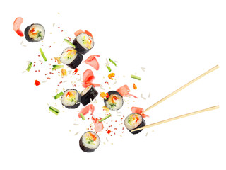 Pieces of sushi fly in the air on a white background © Krafla