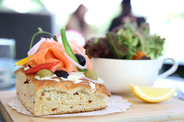 Smoked salmon on toast with salad vegetable