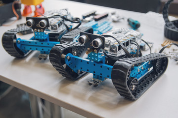 Robot assembled from the designer on the table. Robotics