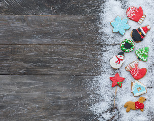 Christmas gingerbread in the snow, a rustic table