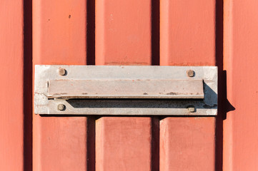 Letter box, Old letterbox or mailbox in the metal gate door traditional way of delivering letters to the house close up
