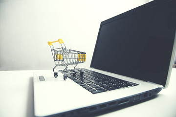 shopping basket on laptop
