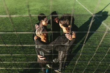 Foto op Plexiglas Five a side football team in circle © Jacob Lund