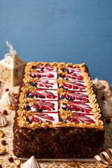 Delicious Chocolate cake with banana, walnut, meringue