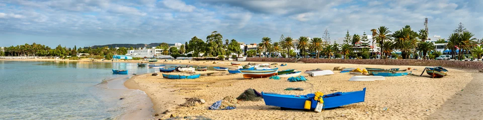 Fototapeten Tunesien Holzboote an der Mittelmeerküste in Hammamet, Tunesien  © Leonid Andronov