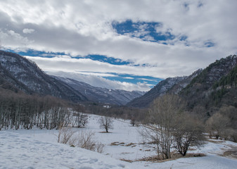 snow-capped mountains on a cloudy day