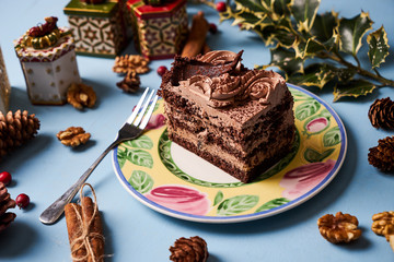 Slice of chocolate cake with custard cream