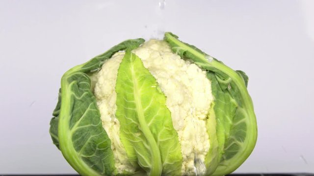 Water is poured onto cauliflower