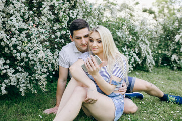 happy couple hanging outside