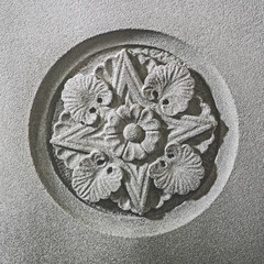 Ornate generic floral plasterwork shot straight on.