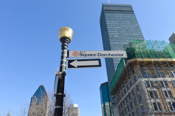 Square-Dorchester street in Montreal downtown among skyscrapers, Canada